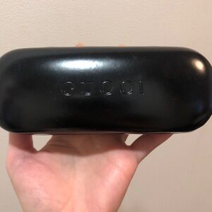 Gucci glasses case.